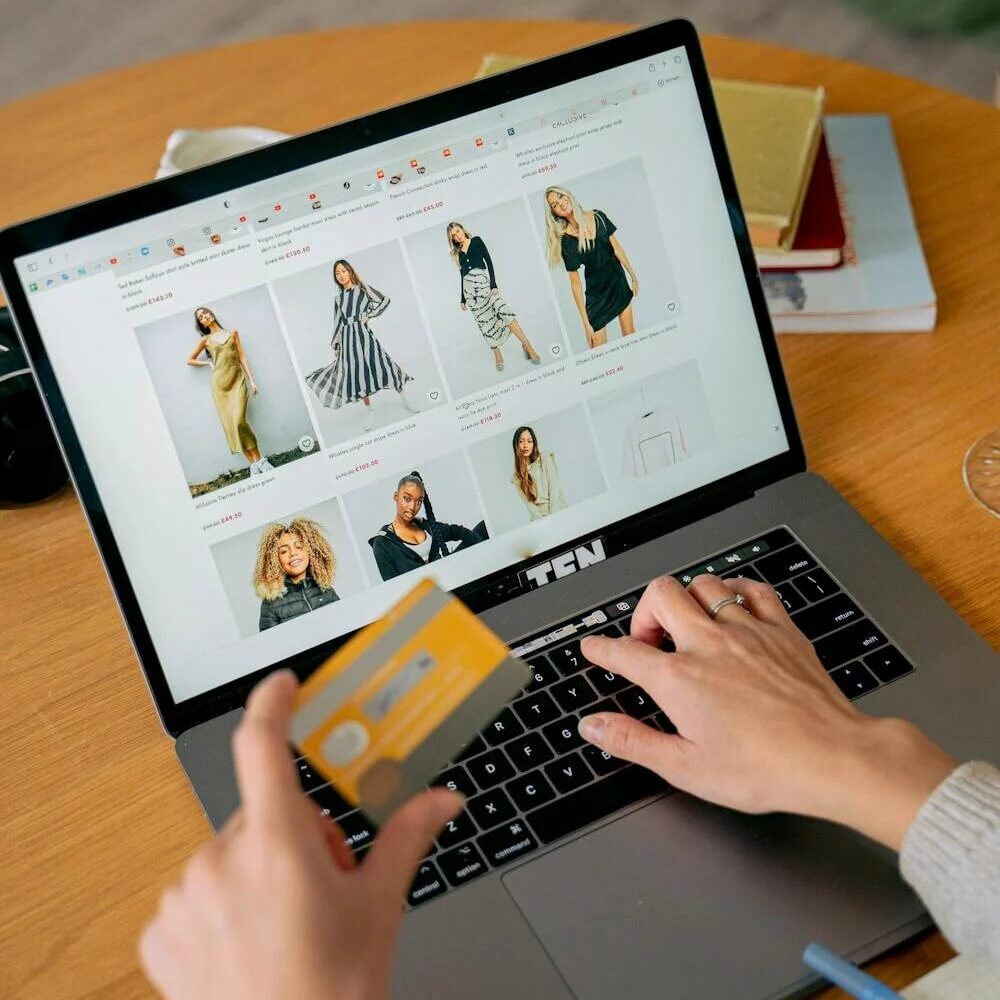 person making a purchase from an ecommerce clothing site